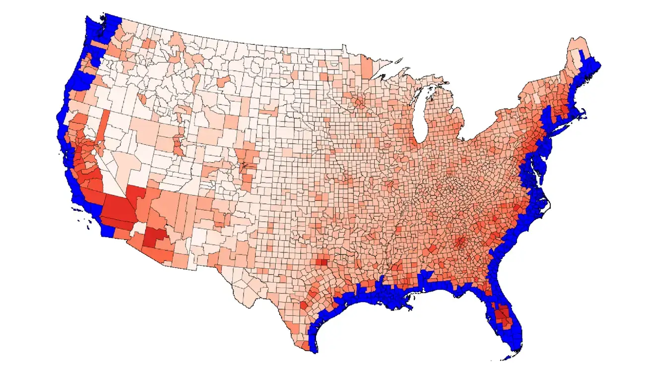 U.S. counties that would be impacted by six feet of sea level rise are shaded in blue. Inland counties are shaded in red according to how many migrants they would receive from coastal areas.